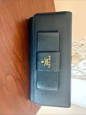 Prada Black Bow-Front Saffiano Continental Wallet with Gold Logo